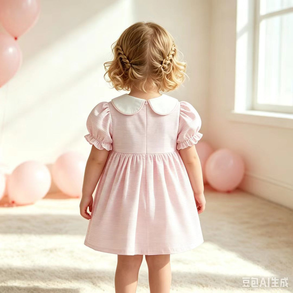 Robe de bébé fille brodée à carreaux roses