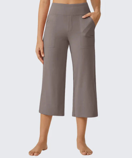 Les femmes haute taille emportent droit pantalons de yoga occasionnels avec des poches