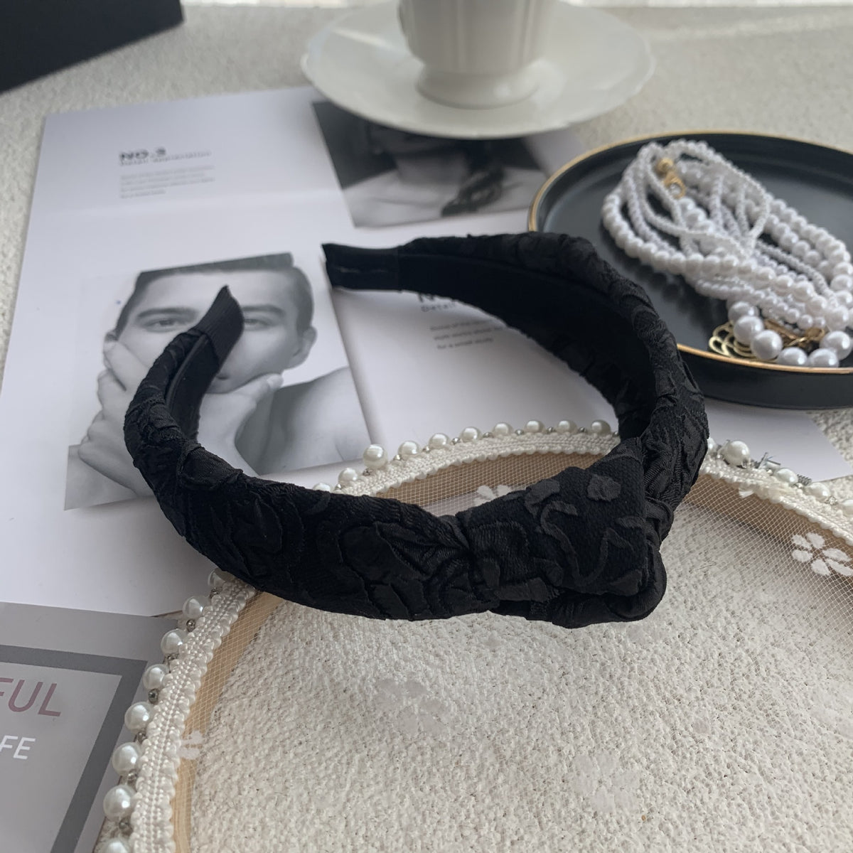 Exaggerated Black Wood Ear Hoop Hairstyle