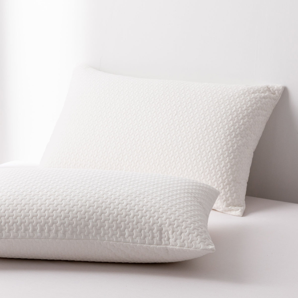 Couverture de l'appuie-tête avec couche d'isolement