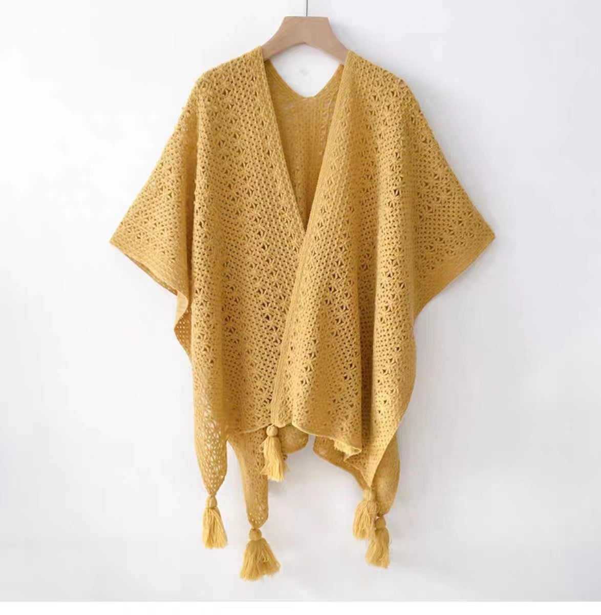 Femmes tricotées Tassel-Trimmed Open-Front Cape Pour les photos
