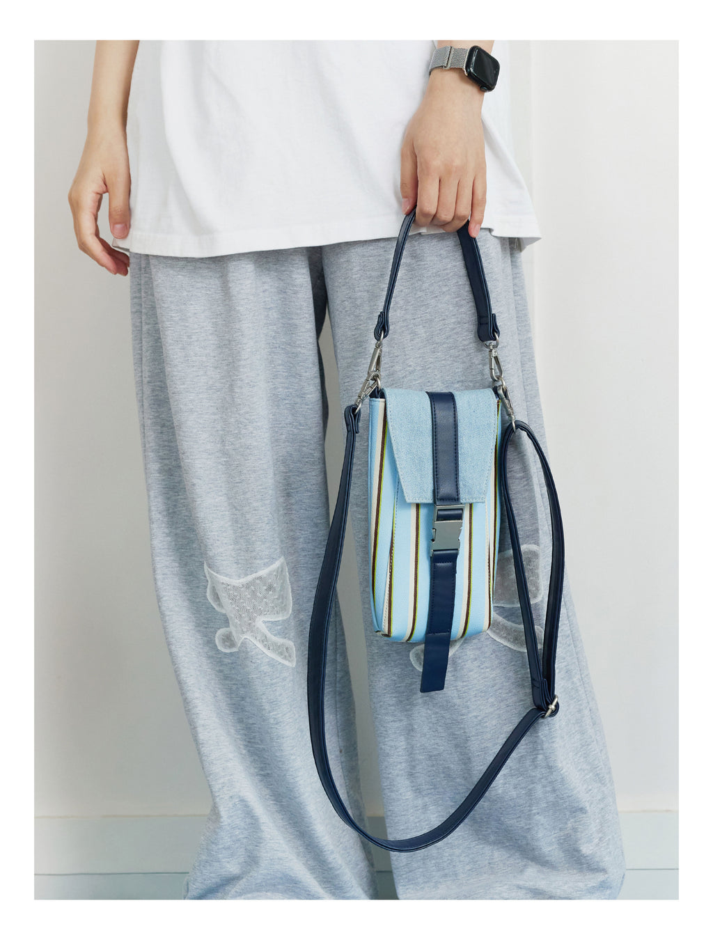 Sac de téléphone rayé