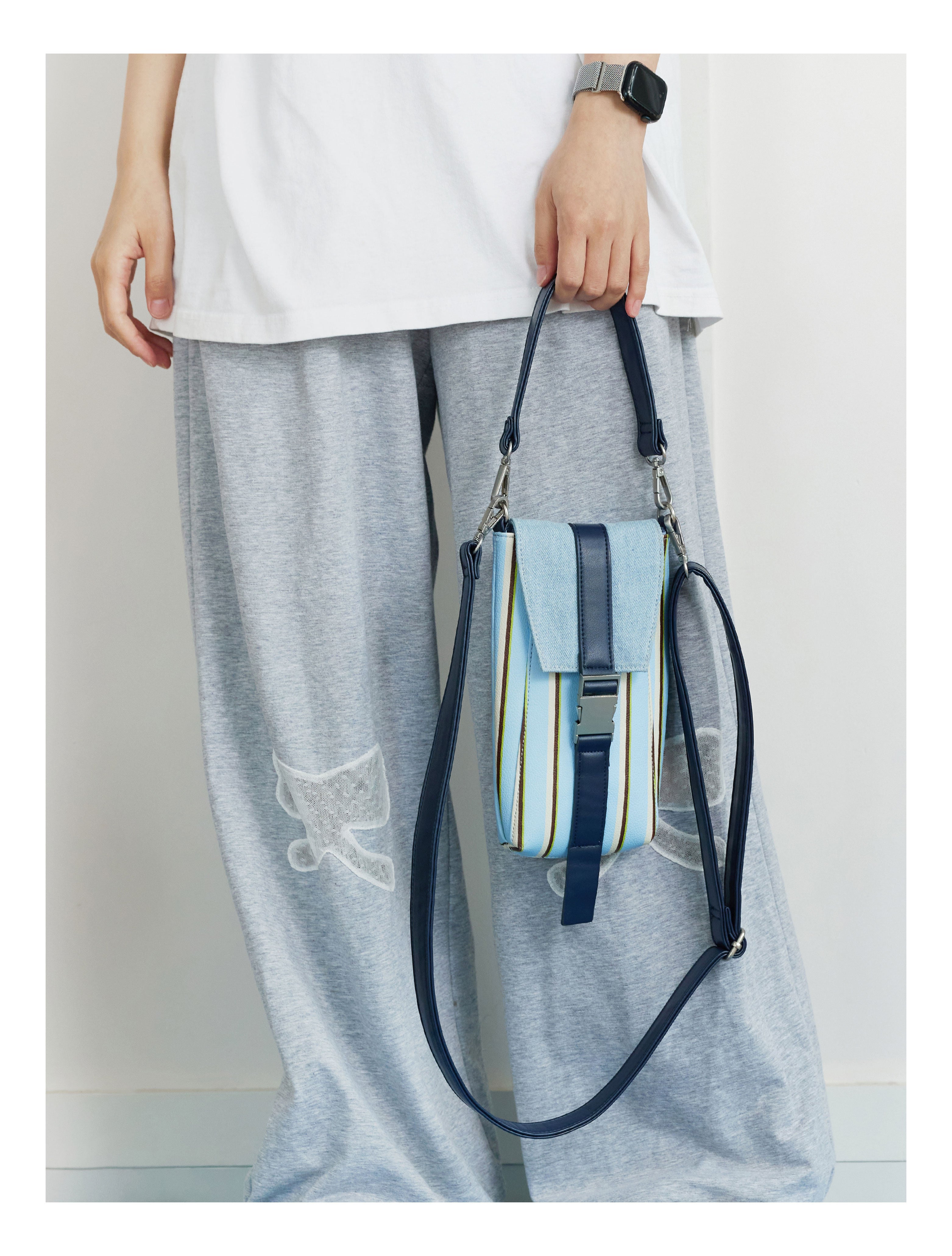 Sac de téléphone rayé