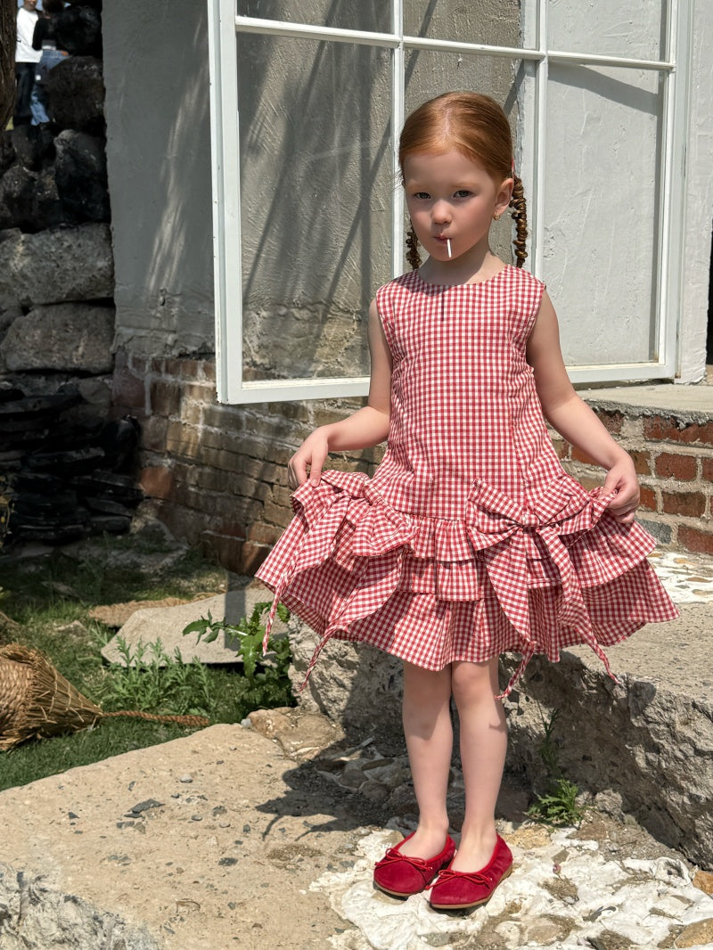 Robe à carreaux sans manches de fille avec arc rouge et jupe à manches multiples