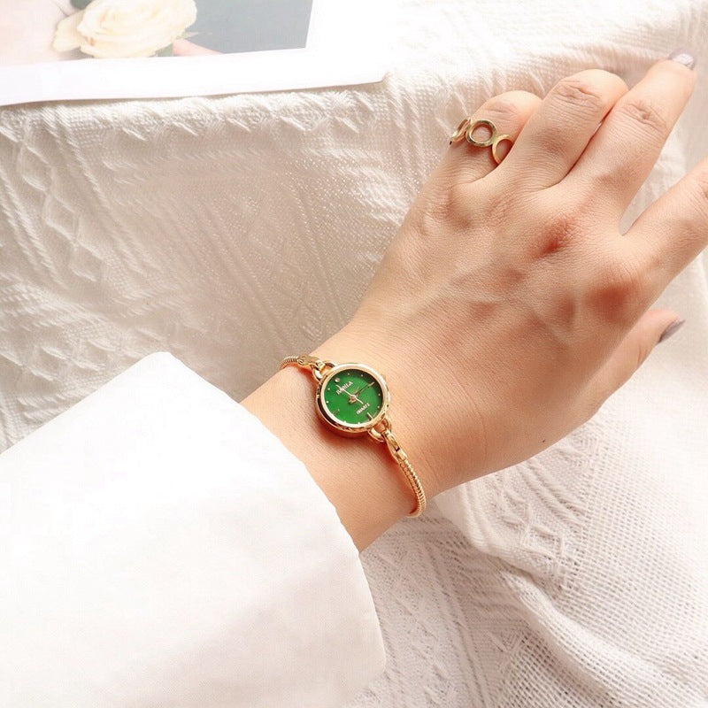 Rétro Petite montre dorée Quartz montre féminine