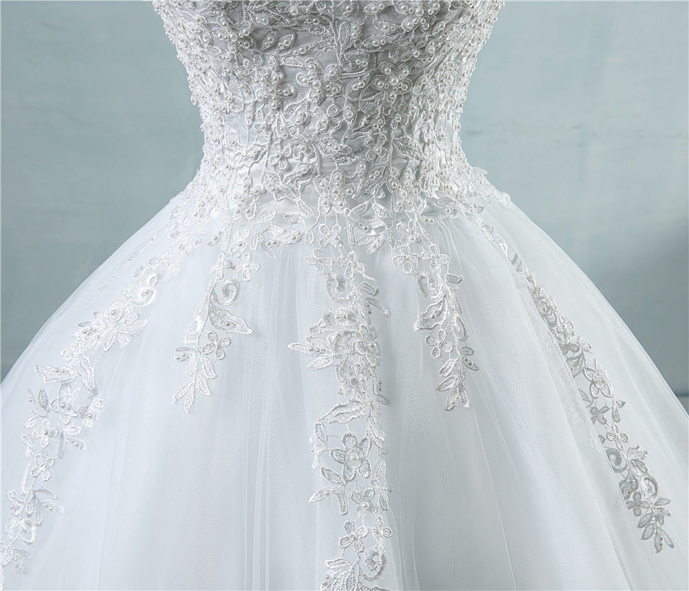 Robe de mariée haute taille avec col en V profond