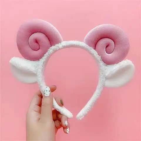 Coincer mignon en peluche de moutons