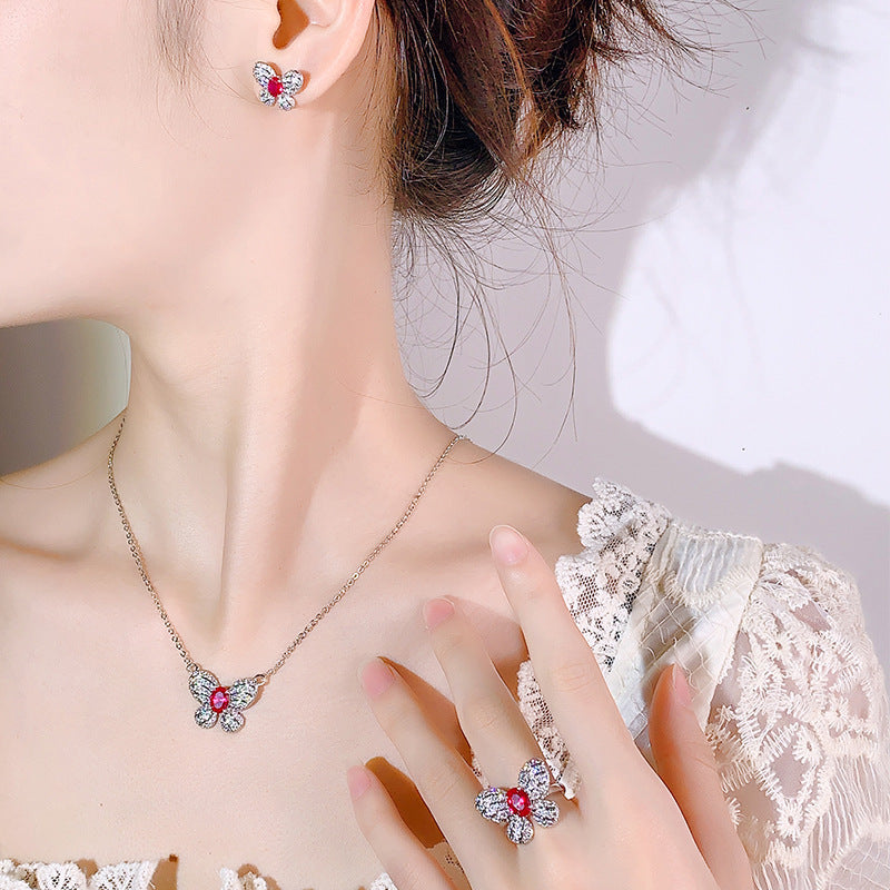 Boucles d'oreilles rubis tendance papillon collier et bague