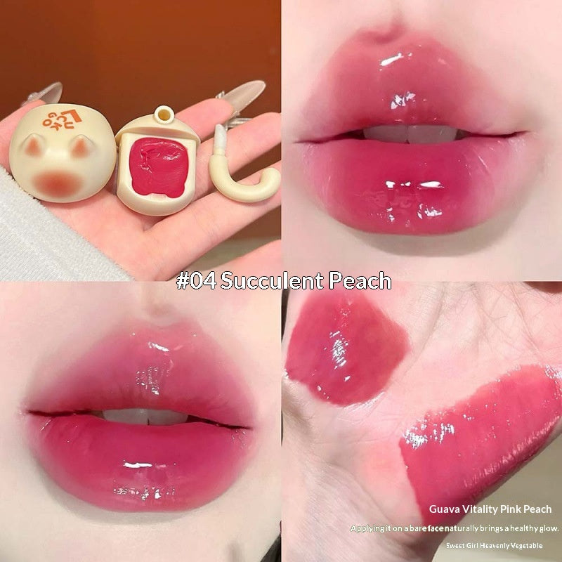 Orange Cat Lip Glaze Sheer et jeune avec une finition miroir comme Dewy