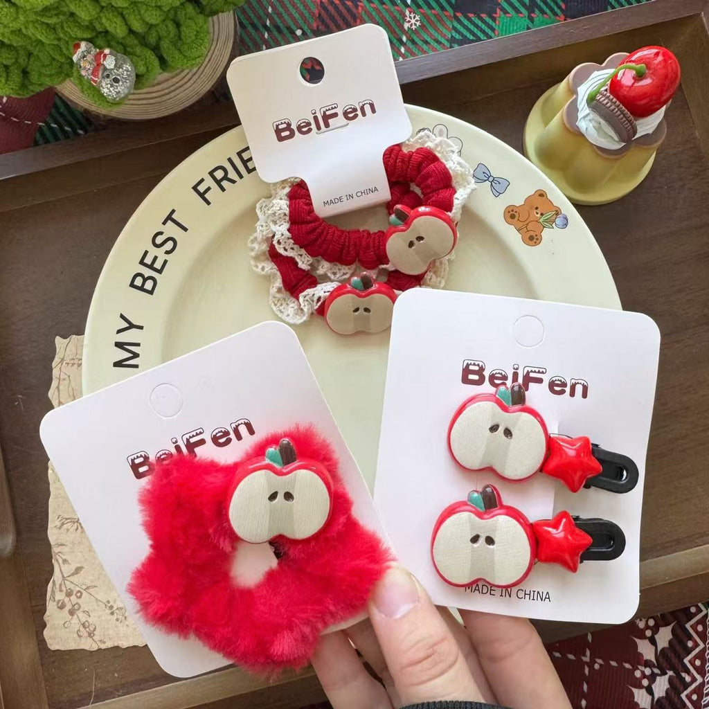 Cartoon créatif Apple et accessoires de coiffure Star avec thèmes de Noël et année