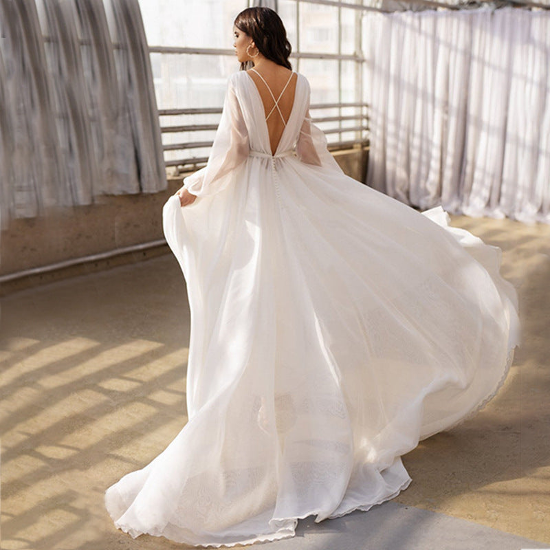 Robe de mariée à manches longues de style français avec une taille ajustée