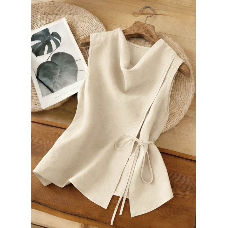 Top en col de bateau couleur apricot avec des paillettes de cravate