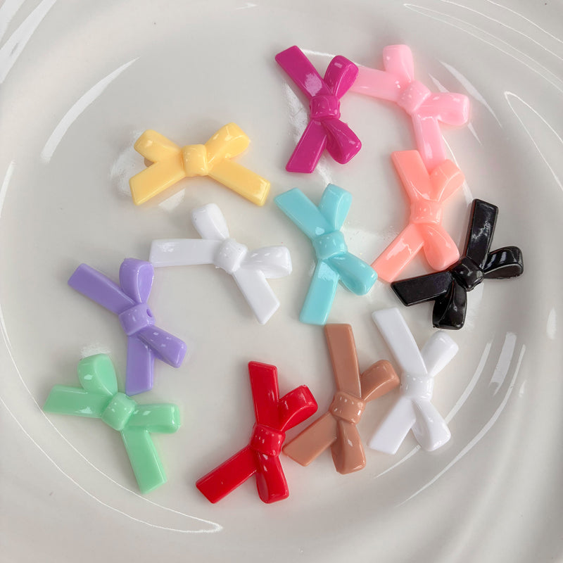 Perles d'espacement en forme de Bowknot acrylique