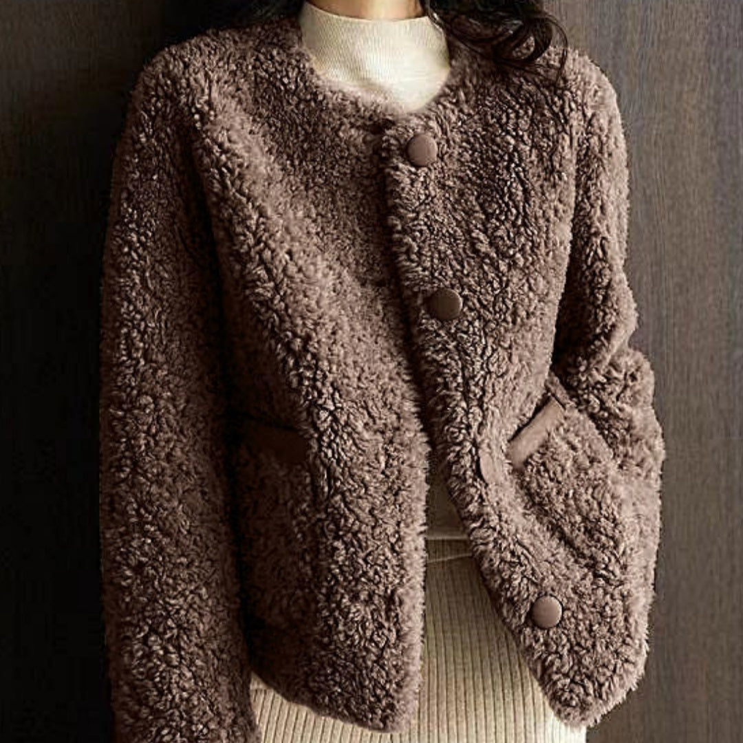 Manteau court doublé en cuir et en fourrure combiné avec du lambswool