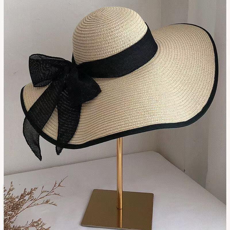 Chapeau de style français Bow Straw pour femmes Protection solaire d'été avec une large brim