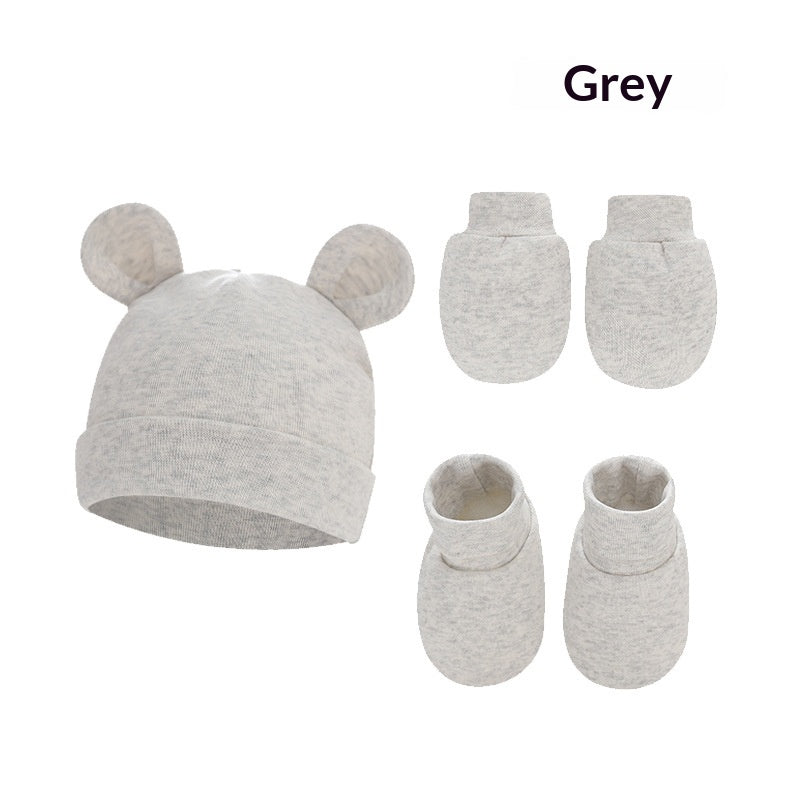 Chapeau nouveau-né Mittens et chaussettes avec des chaussures en caoutchouc