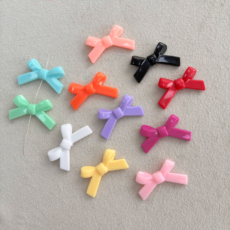 Perles d'espacement en forme de Bowknot acrylique