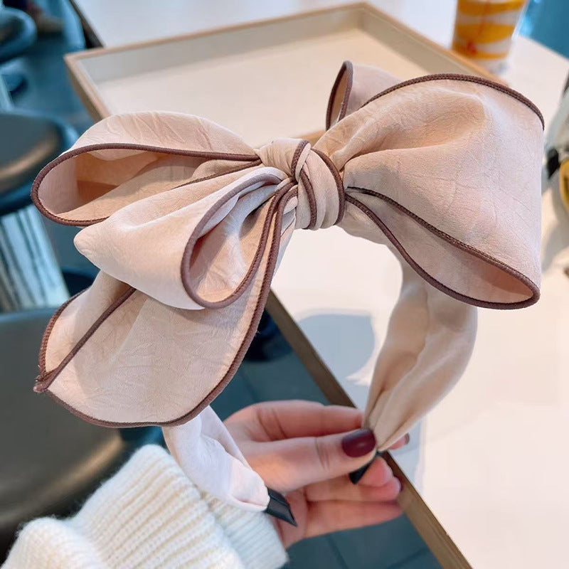 Bandeau large bordé avec un arc 3D pour les femmes