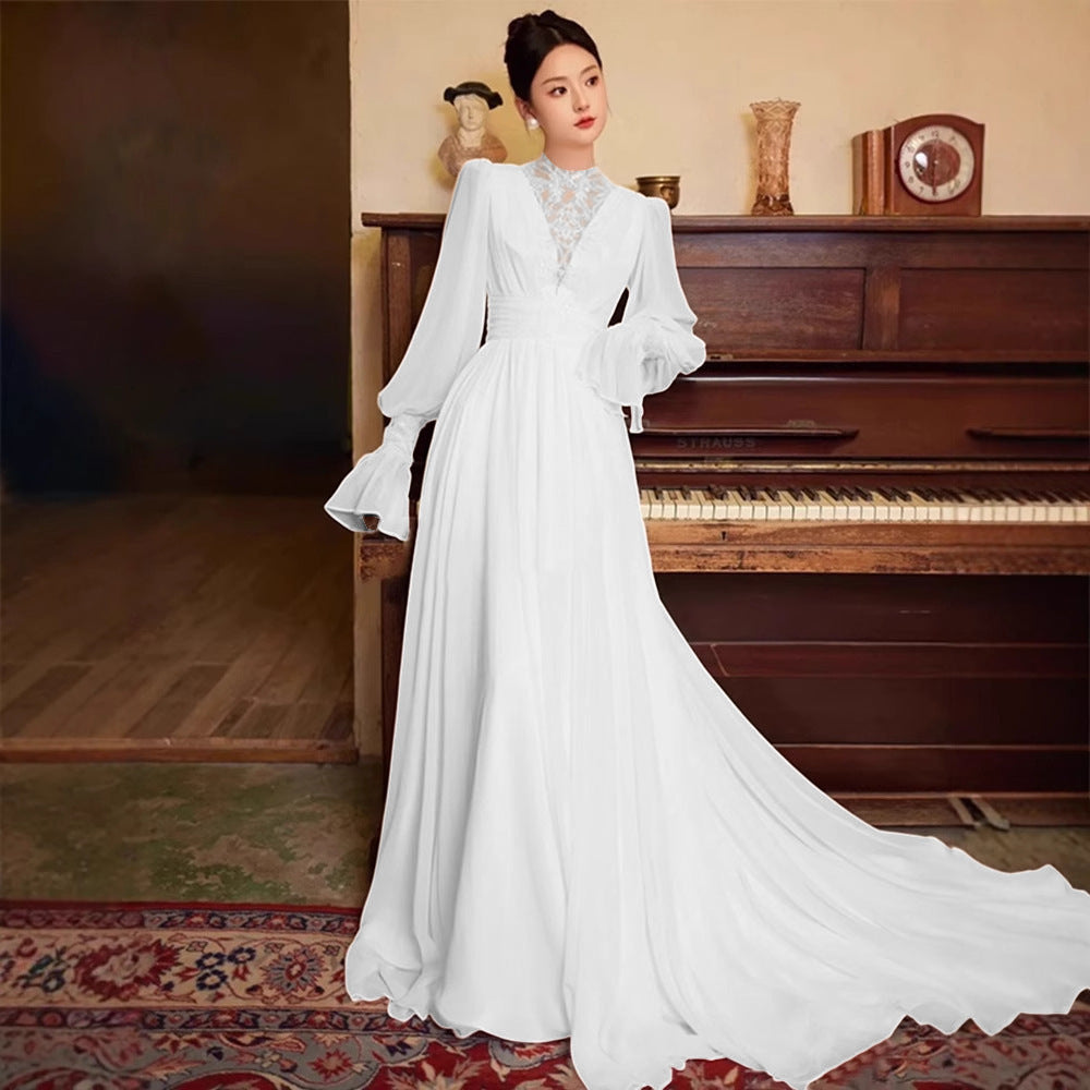 Robe de mariée vintage en dentelle de style français avec manches de puff