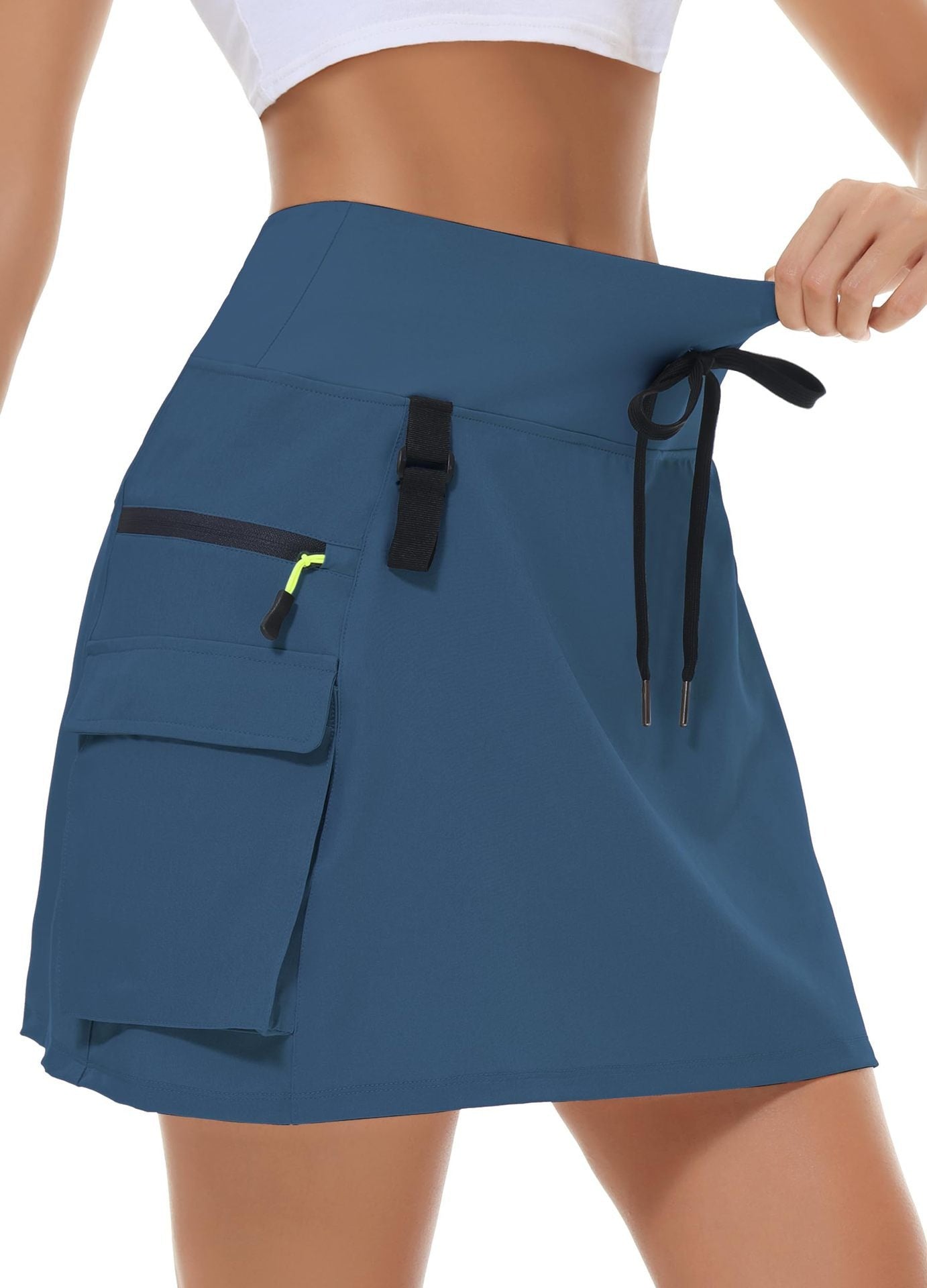 Jupe de tennis à manches rapides en polyester à vente chaude pour femmes avec une taille élastique et des poches zippées