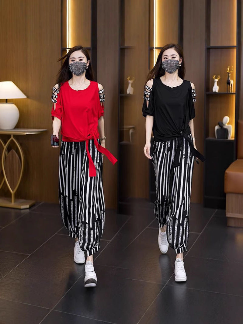 Ensemble en deux parties, haut et pantalons irréguliers