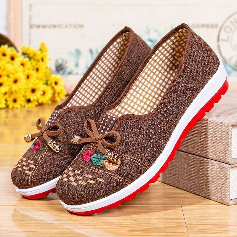 Chaussures en tissu brodé antidérapant avec une semelle souple