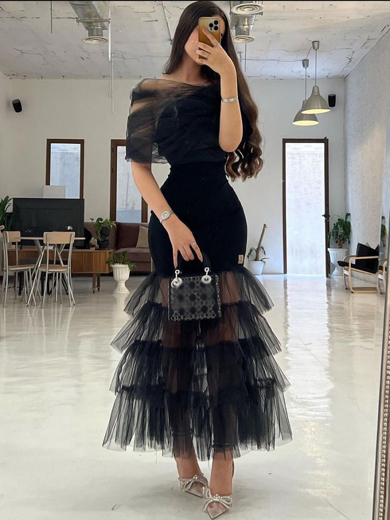 Robe longue avec lambris en mesh et un style de soirée sans sangle