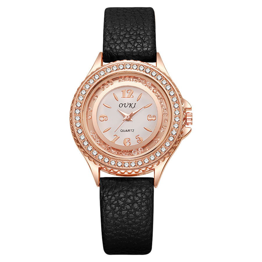 Élégante et minimaliste montre féminine ronde en strass