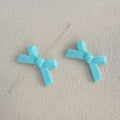 Perles d'espacement en forme de Bowknot acrylique