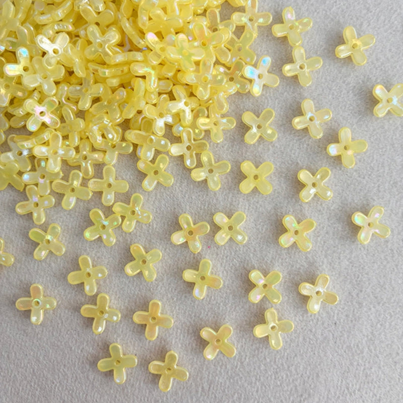 Perles de fleurs en acrylique avec paillettes dorées
