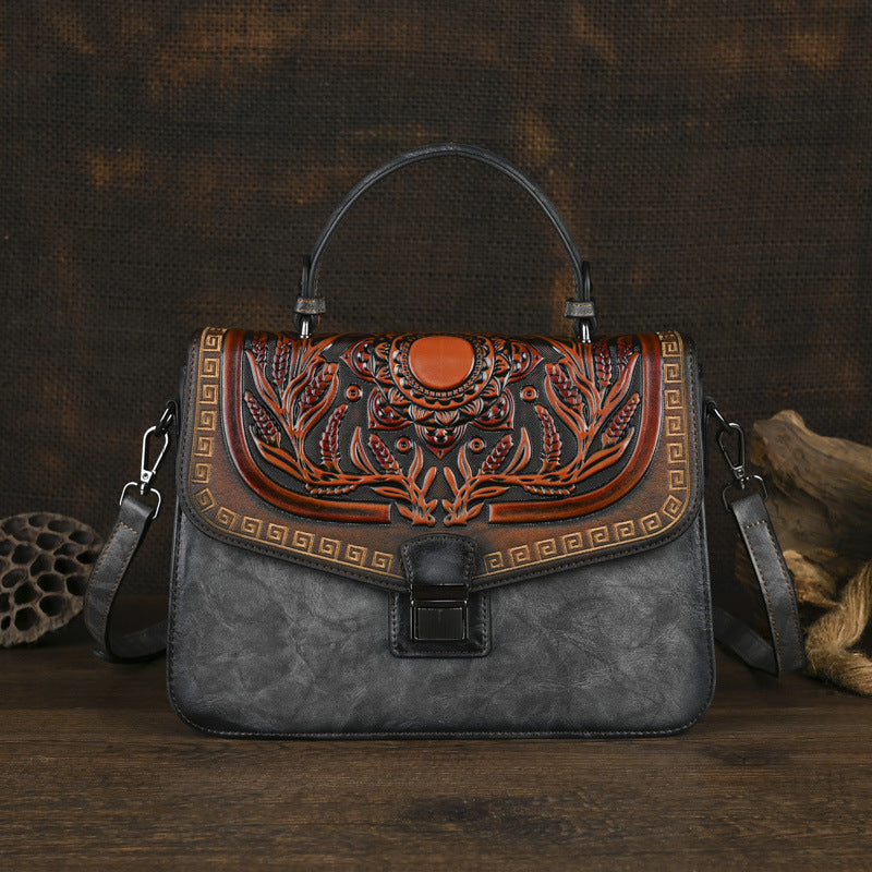 Sac à main artisanal avec une bande transversale et un design de bloc de couleur