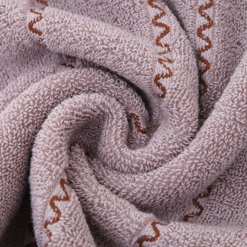Serviette de coton et lavage du visage