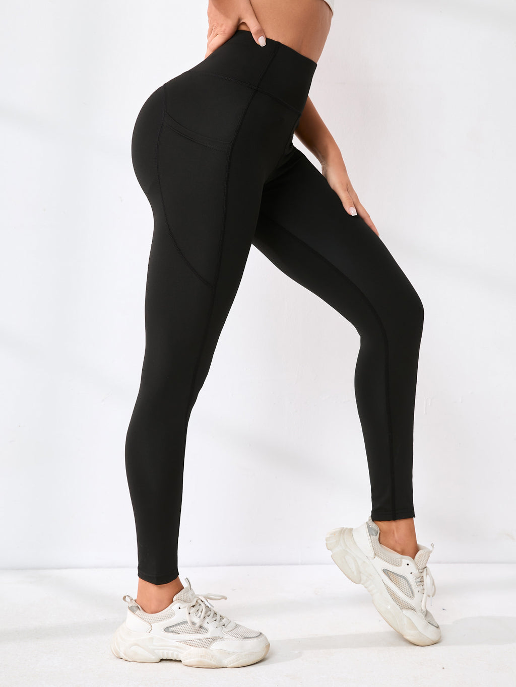 Pantalon de yoga européen et américain Couleur solide Splicing Hip-Lifting Pocket Outd