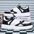 Chaussure classique de skateboard d'étudiants en blanc à bas sommet