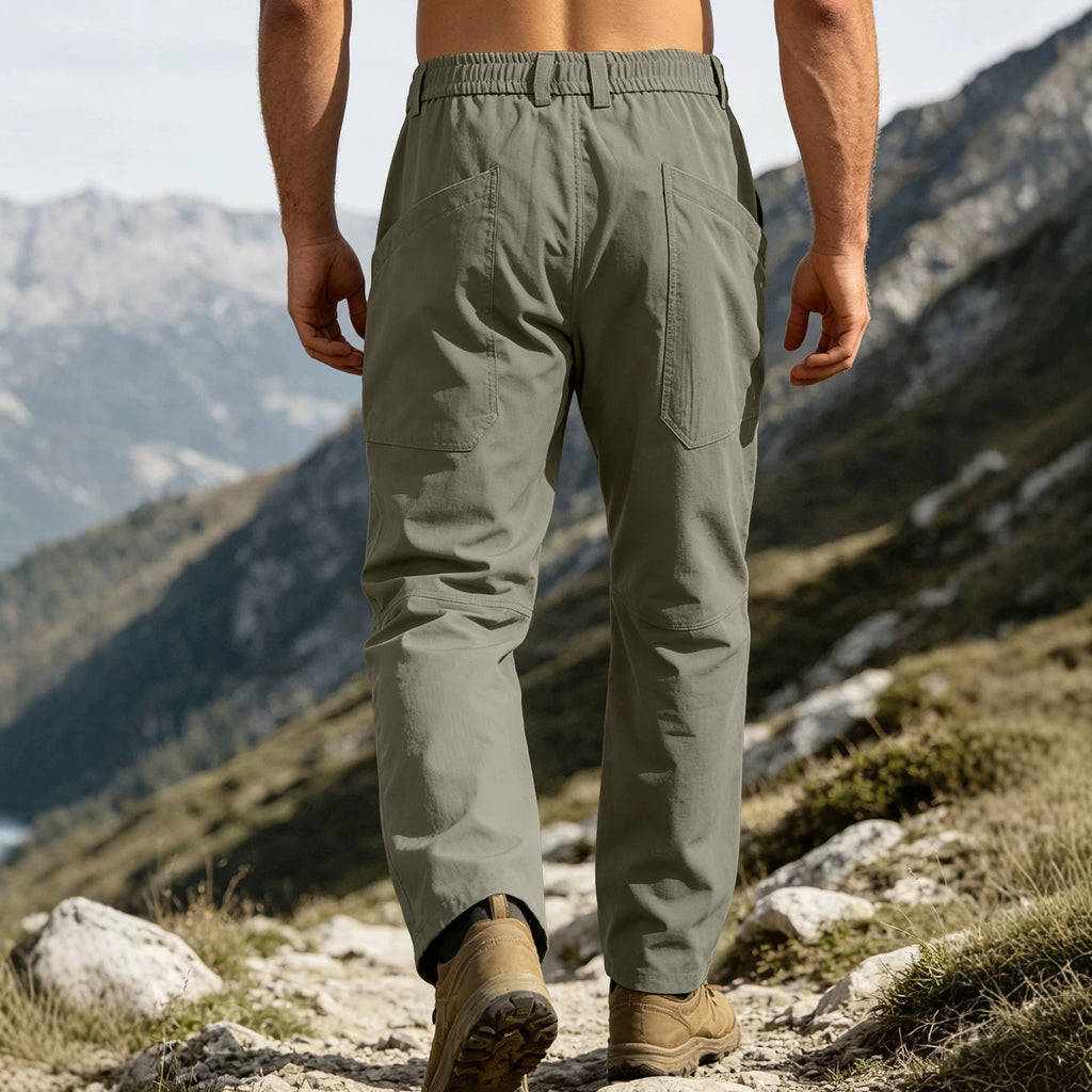 Pantalon de travail imperméable de printemps et d'automne pour hommes avec de multiples poches et une grande taille extérieure