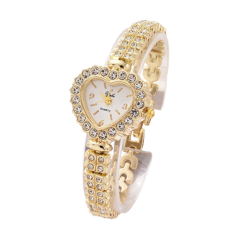 Montre double fuite dans une boîte cadeau en forme de cœur