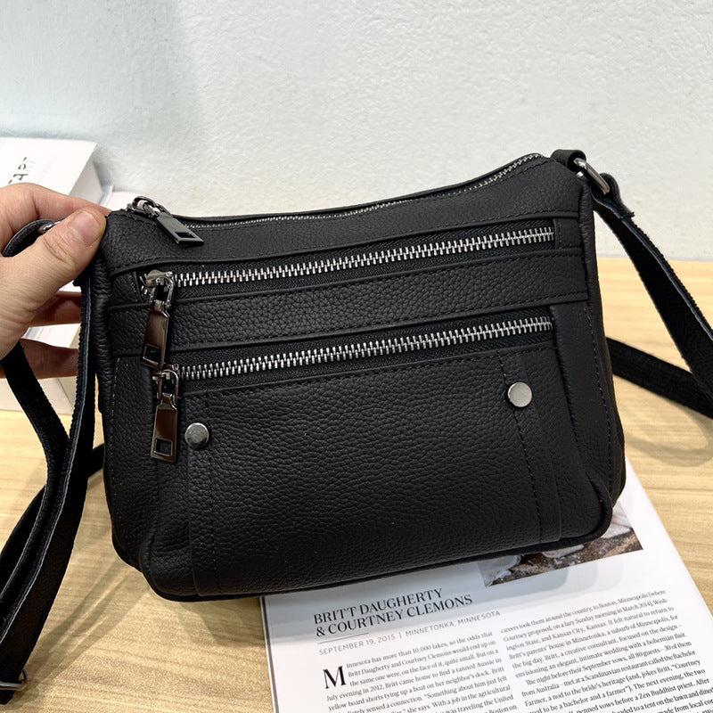 Sac à main en cuir de vache avec bande transversale en cuir véritable