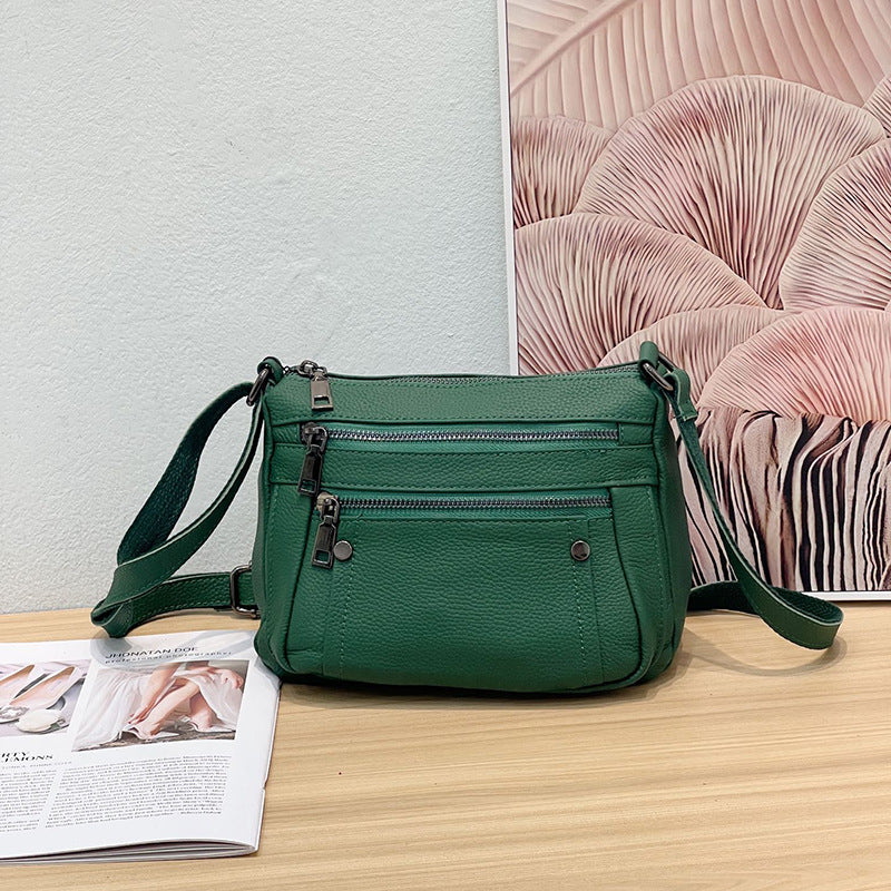 Sac à main en cuir de vache avec bande transversale en cuir véritable