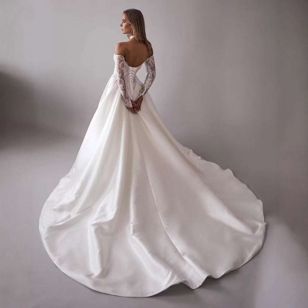 Robe de mariée à manches longues en dentelle à une épaule