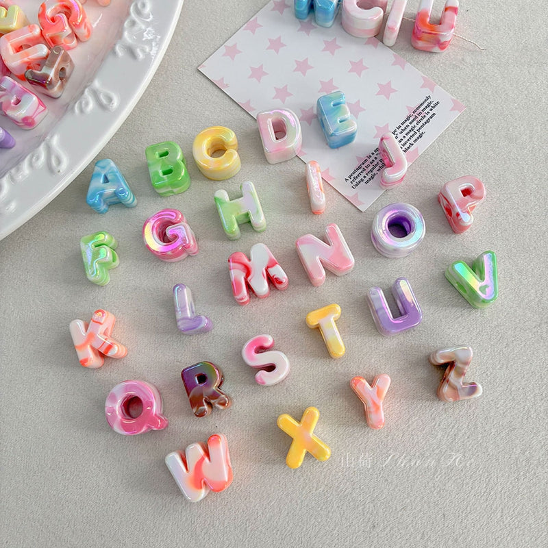 Perles à lettres acryliques plaquées UV