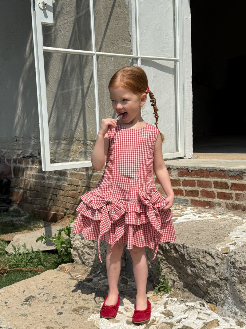 Robe à carreaux sans manches de fille avec arc rouge et jupe à manches multiples