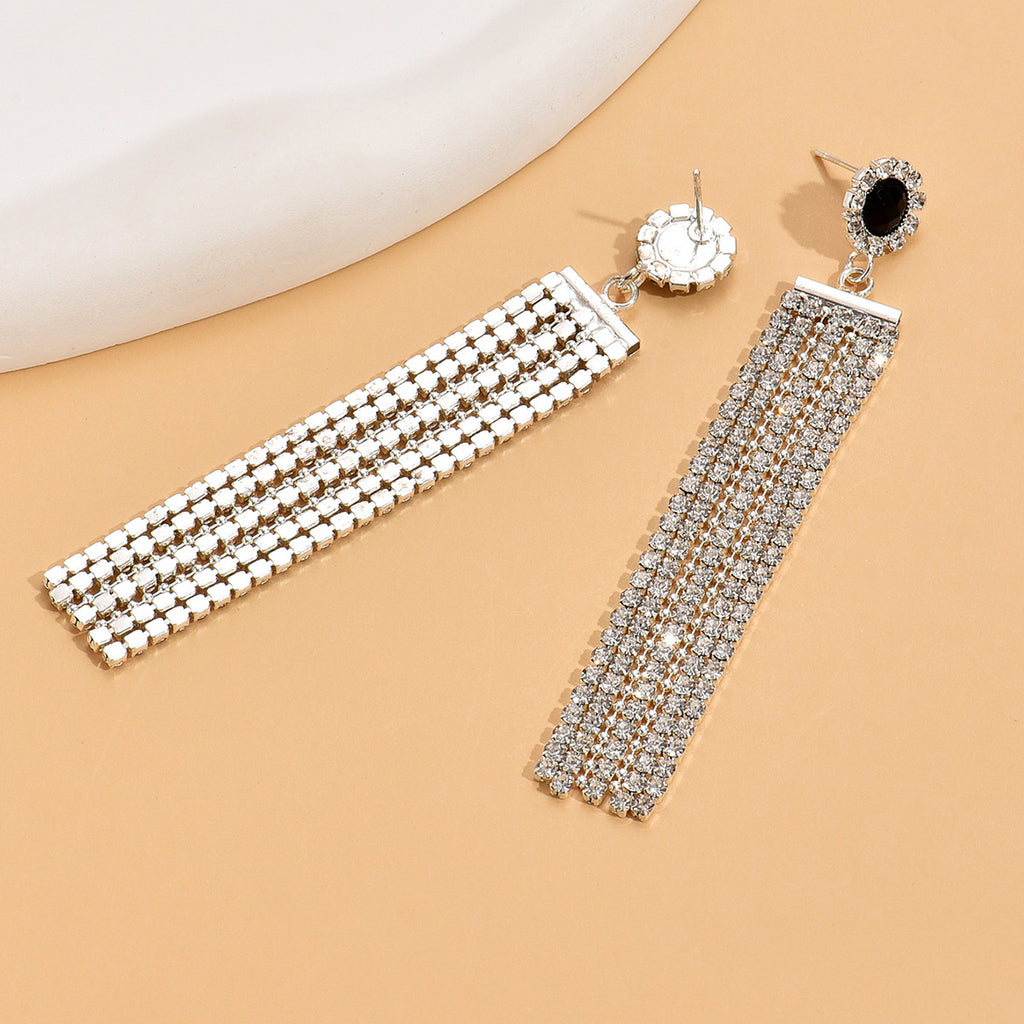 Boucles d'oreilles en strass argenté style