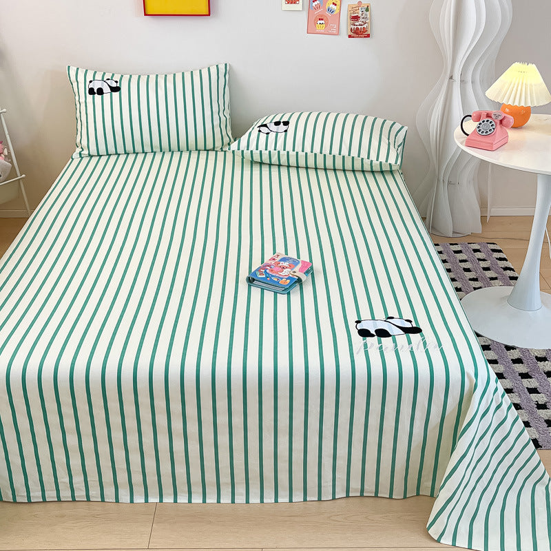 Feuille de lit brodée en coton de couleur enroulée
