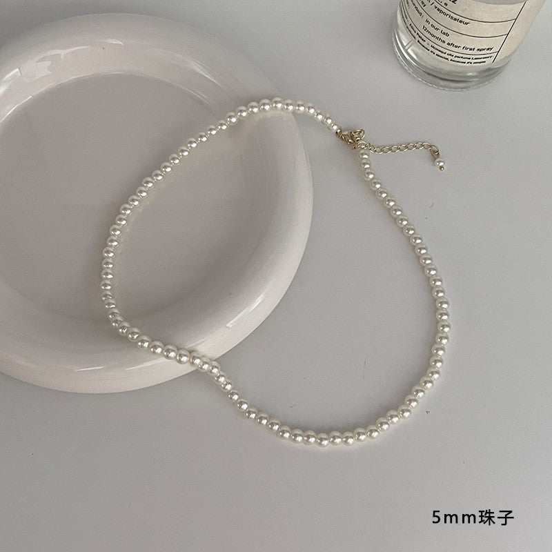 Dainty Faux Pearl Collier pour femmes Minimalist Design de luxe Élégant collier Choker Sw