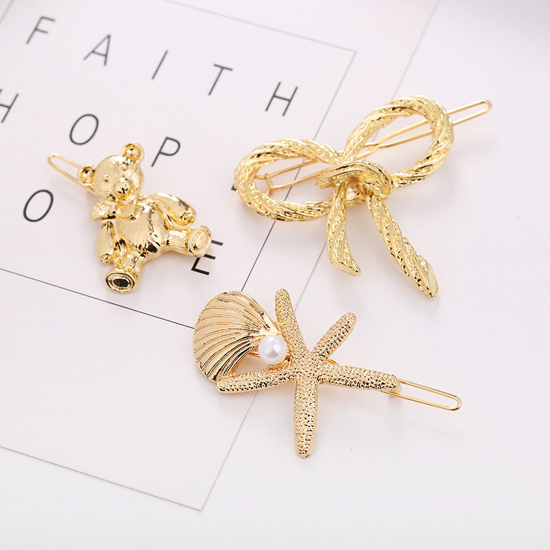 Starfish et Shell All Matching Hair Clip Grog géométrique