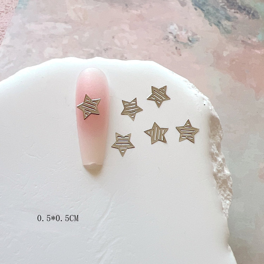 Flakes en métal d'art d'étoile d'or et d'argent