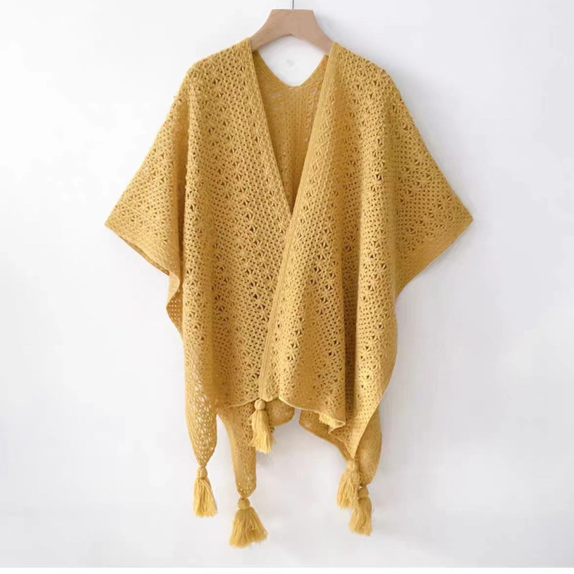 Femmes tricotées Tassel-Trimmed Open-Front Cape Pour les photos