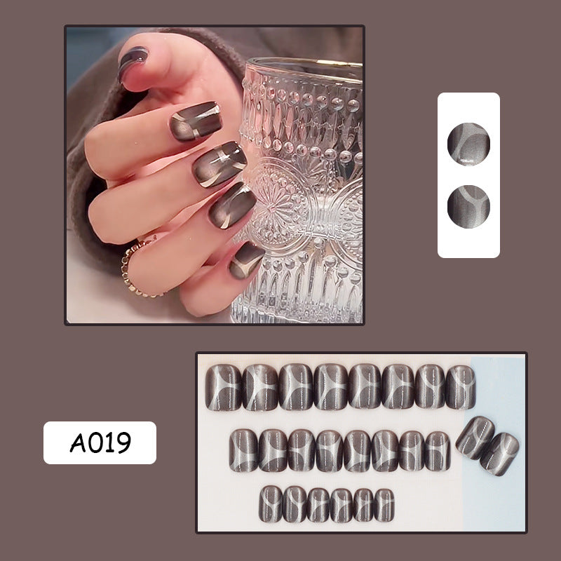 Série d'oeil de chat porter des ongles d'été