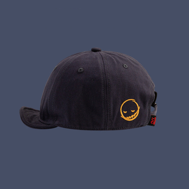 Men's and women's style Embroidered solid color Simple smile face short adjustable brim