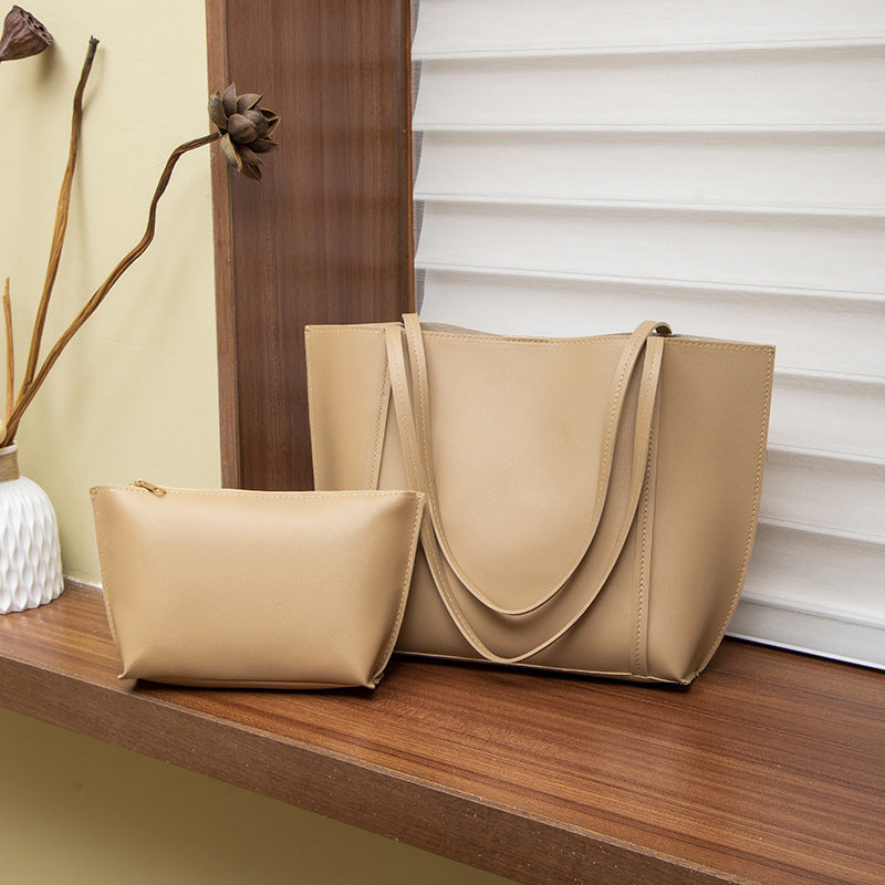 Ce sac à épaule multifonctionnel de style Niche est livré avec un plus petit